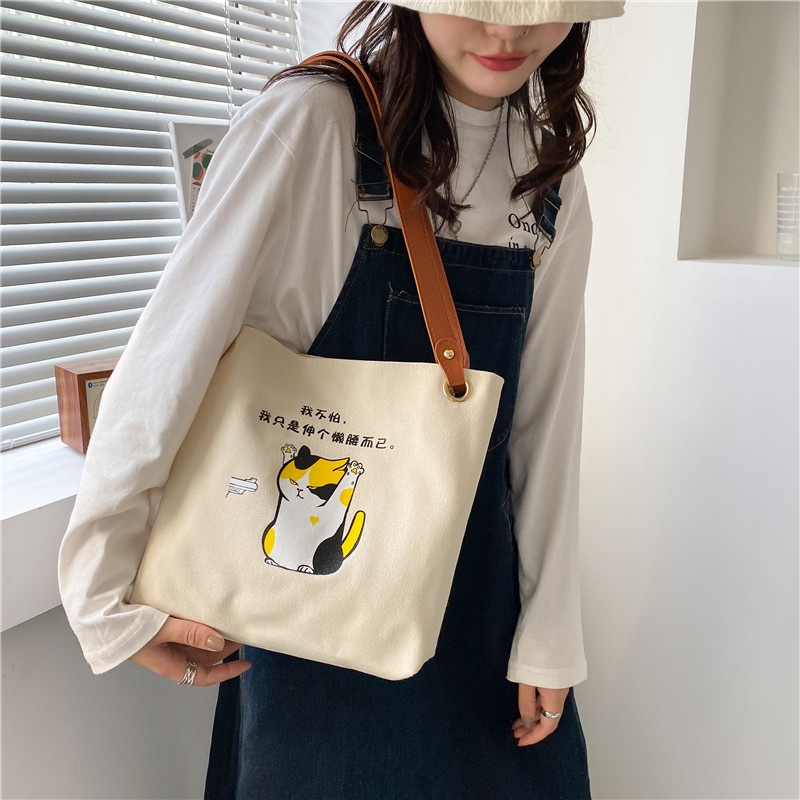 Túi đeo vai vải canvas sức chứa lớn họa tiết hoạt hình thời trang Hàn Quốc 2021