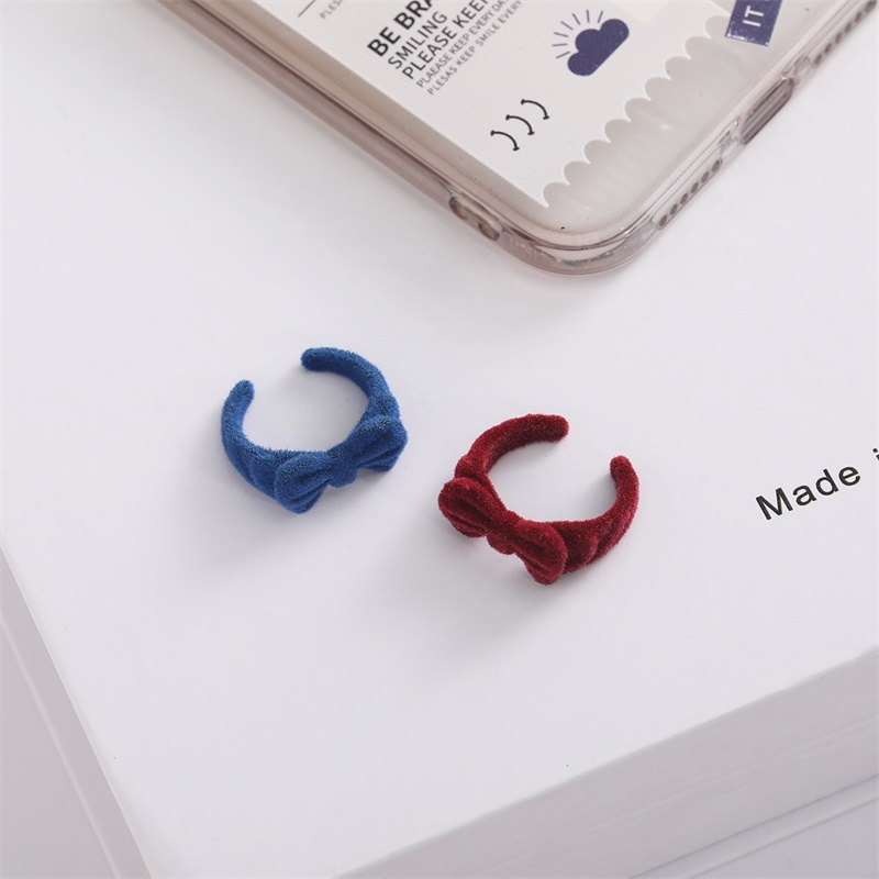 Nhẫn hở thắt nơ phong cách thu đông thời trang mới