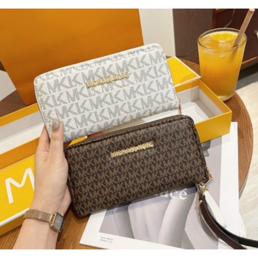 VÍ nữ dài cầm tay MK-V004