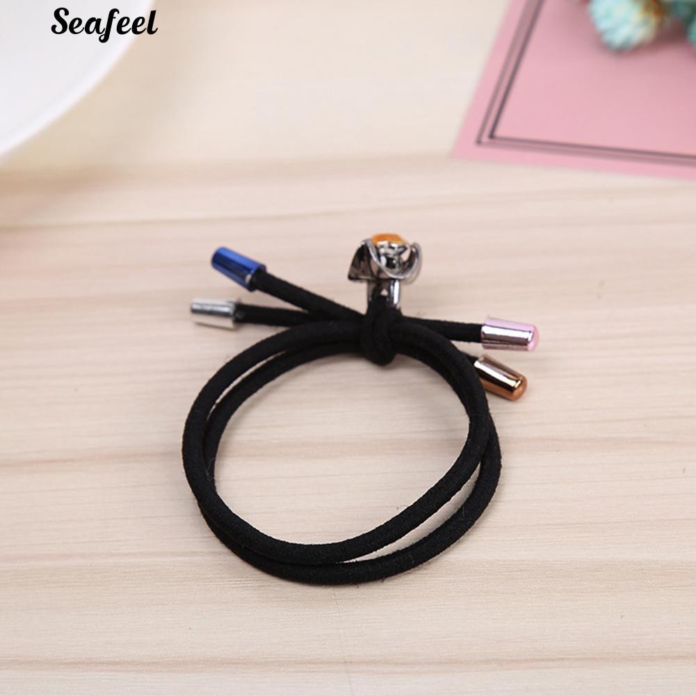 Thun cột tóc đính đá.