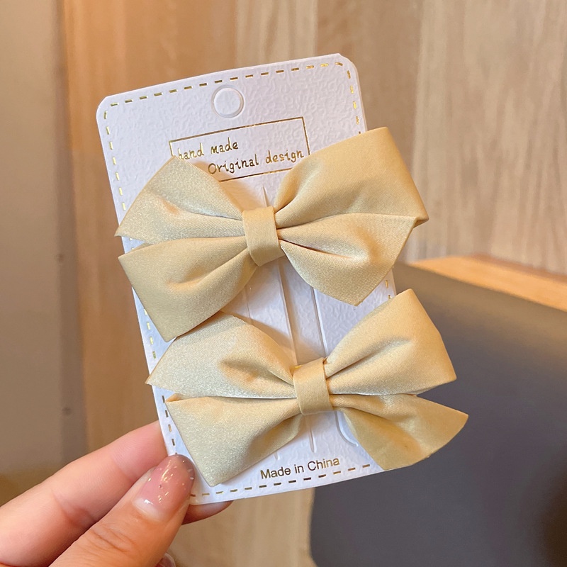 Set 2 Kẹp Tóc Ruy Băng Thắt Nơ Màu Trơn Bằng Vải Phong Cách Hàn Quốc Dành Cho Bé Gái