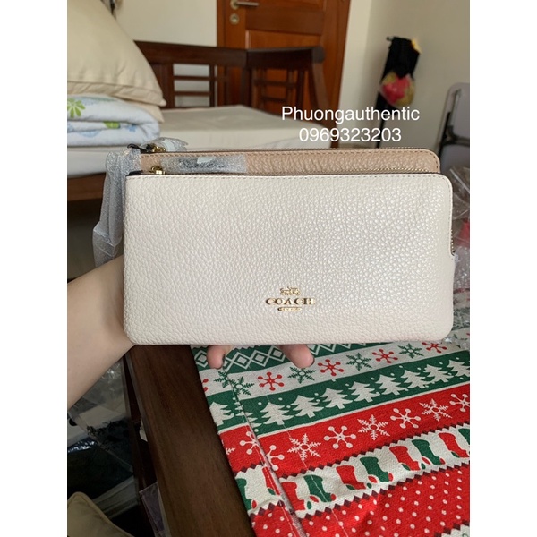 Ví cầm tay Coach logo signature canvas AUTHENTIC