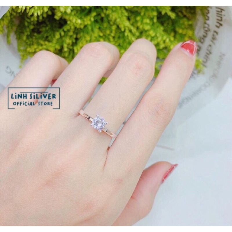 Nhẫn nữ đá chủ 4 chấu bạc ta xinh xắn