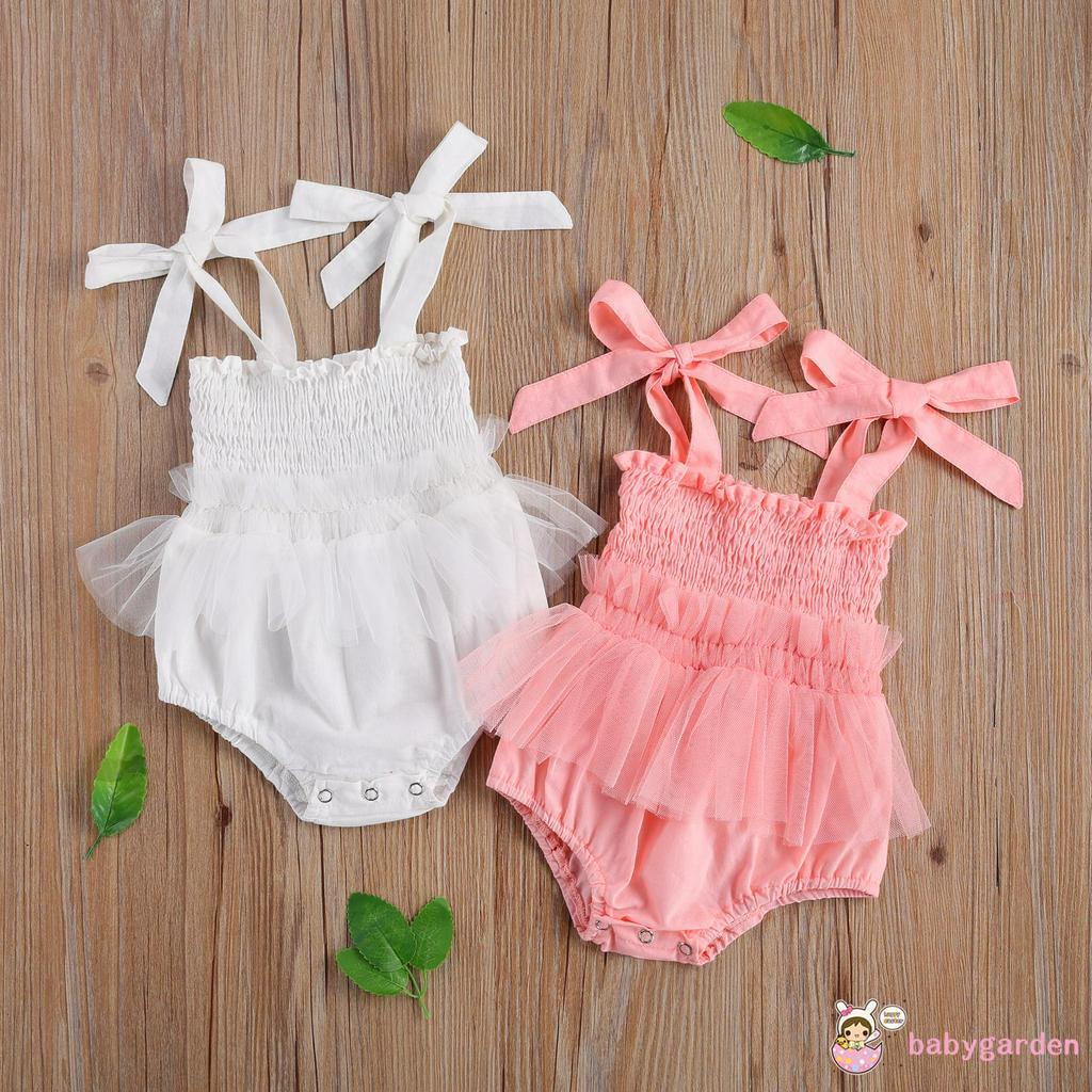 Áo liền quần đính nơ hợp thời trang cho bé gái