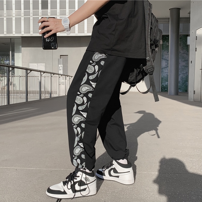 Quần ống rộng họa tiết hoa phong cách thể thao mùa hè mới cho nam và nữ