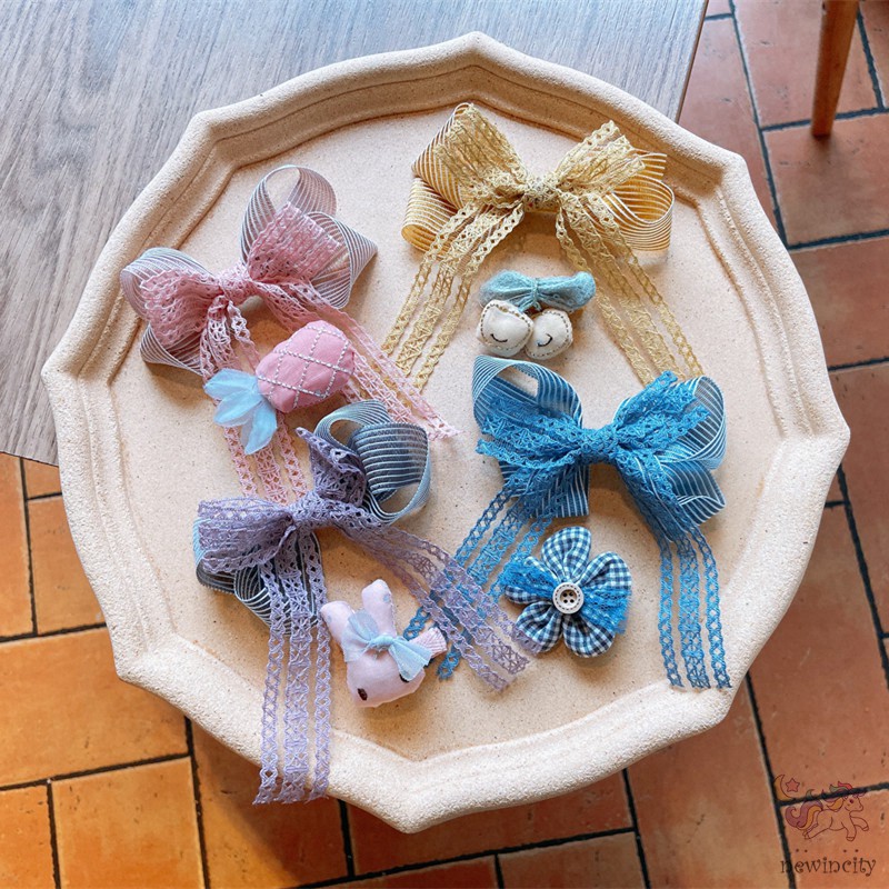 Bộ 2 kẹp tóc đính nơ ren và trang trí nhân vật hoạt hình xinh xắn đáng yêu cho bé gái