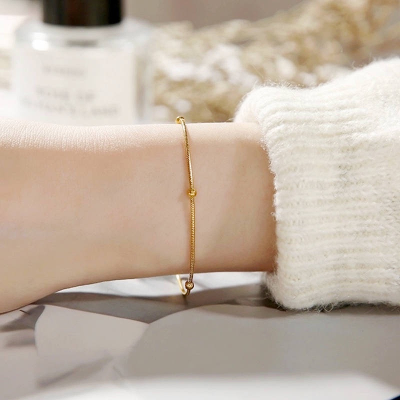 Vòng tay titan nữ không gỉ không phai màu lắc tay nữ mạ vàng 18k kiểu dáng viên bi phong cách nhẹ nhàng