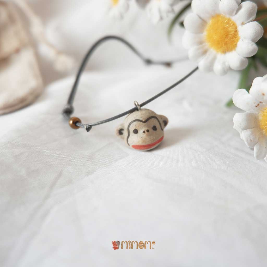 Vòng gốm mặt khỉ