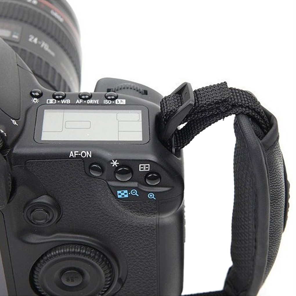 dây da đeo tay giữ máy ảnh DSLR Nikon Canon (đen)