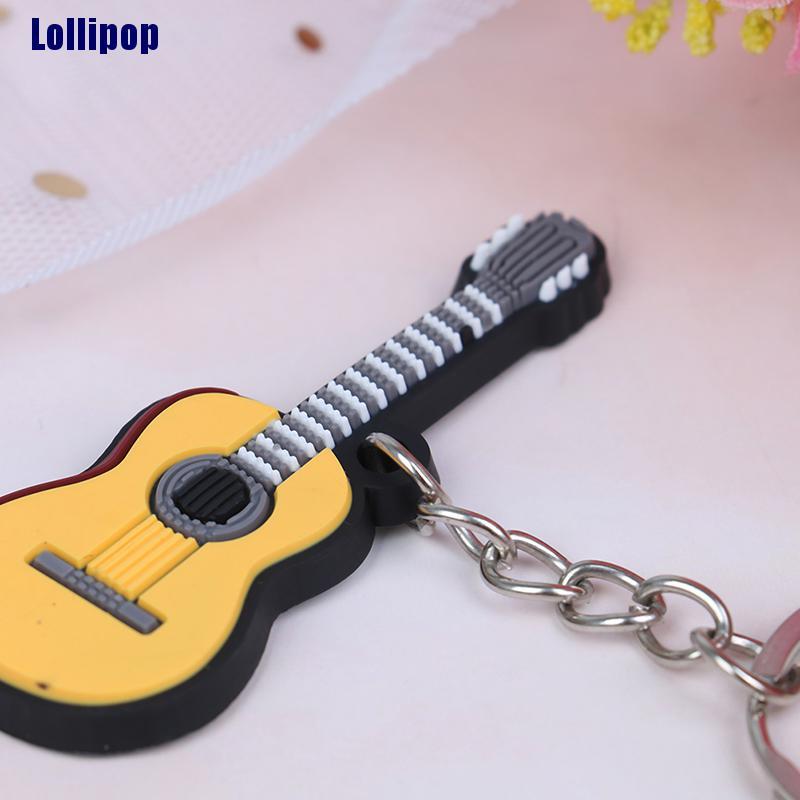 Set 2 Móc Chìa Khóa Bằng Silicon Mềm Hình Đàn Guitar / Ukulele / Điện Oikw