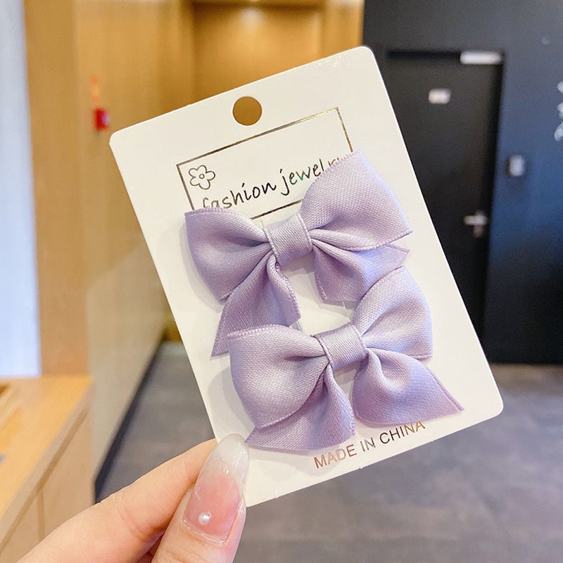 Set 2 kẹp tóc trang trí nơ đáng yêu dành cho bé gái