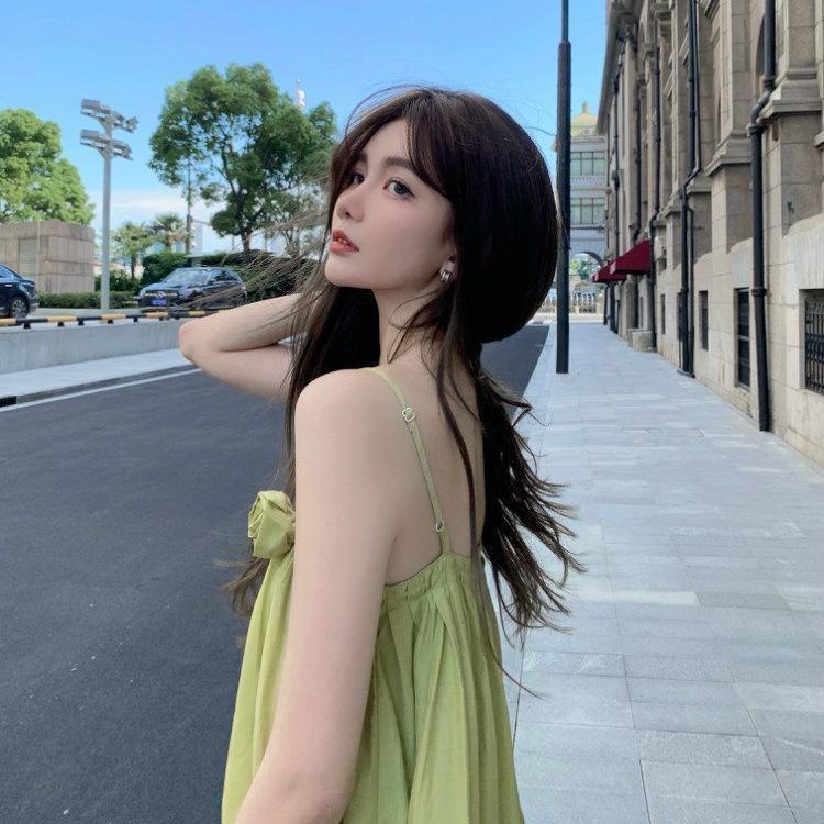 Đầm Hai Dây Họa Tiết Hoa Trà Màu Xanh Lá Nhạt Phong Cách Retro Pháp Xinh Xắn Thời Trang Đi Biển