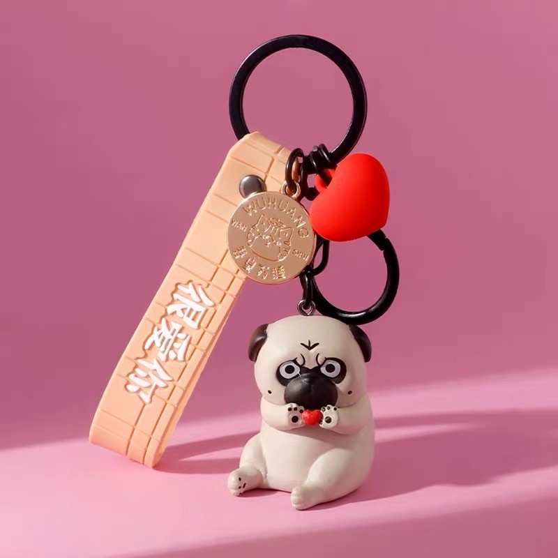 Móc khóa Chó pug nô tì ôm trái tim Mèo hoàng thượng