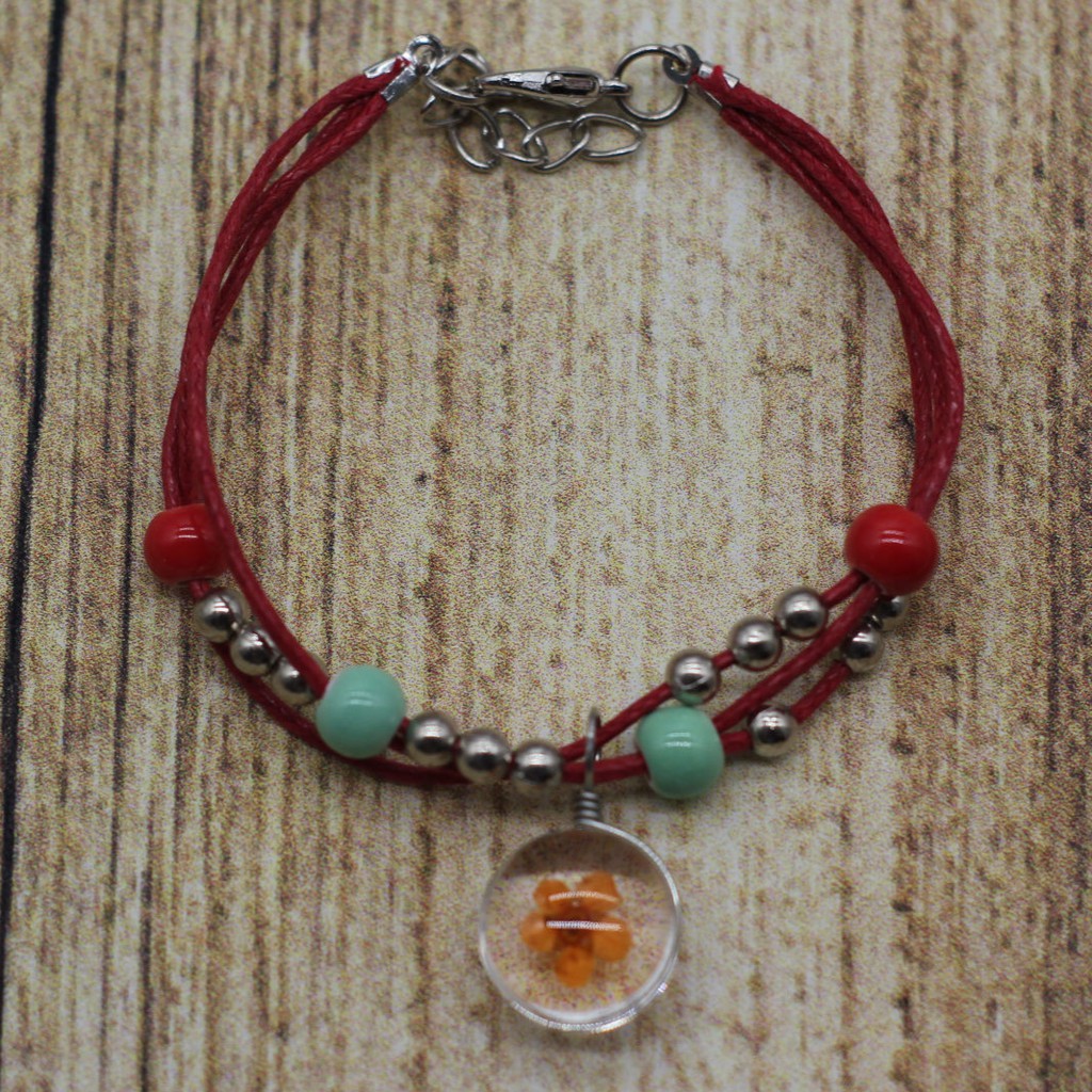 VT63 Vòng tay hạt gốm mặt hoa cúc 5 cái/lốc