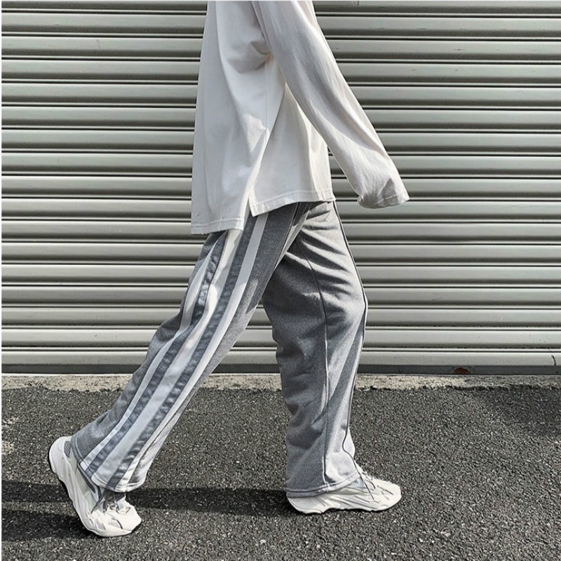 Quần dài ống rộng kẻ sọc phong cách Hàn Quốc thể thao quần nam ống suông trắng thời trang quần dài sọc retro cho nam nữ