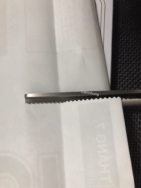 Kéo cắt răng cưa