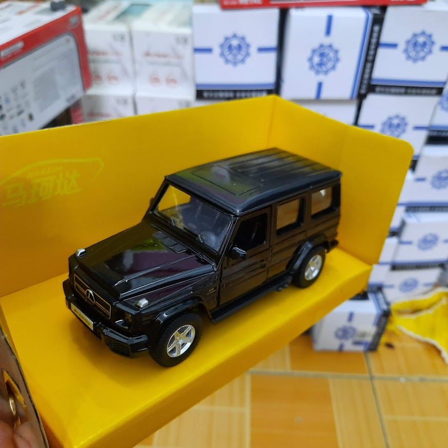 Mô hình xe ô tô Mercedes G63 AMG tỉ lệ 1:36 Đồ chơi trẻ em bằng sắt mở 2 cửa bên