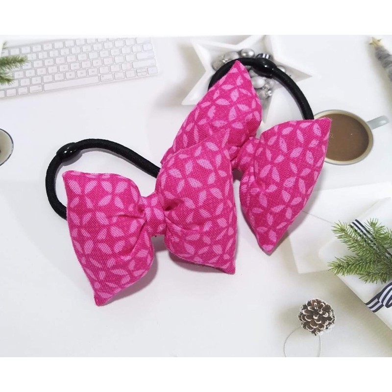 Chun cột tóc hình chiếc nơ nhồi bông