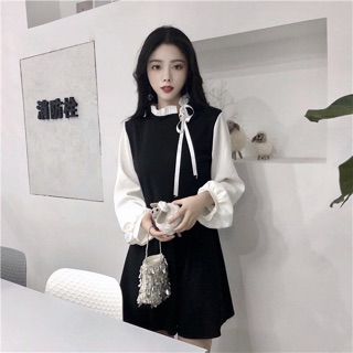 Váy đen phối tay sơ mi cổ nơ