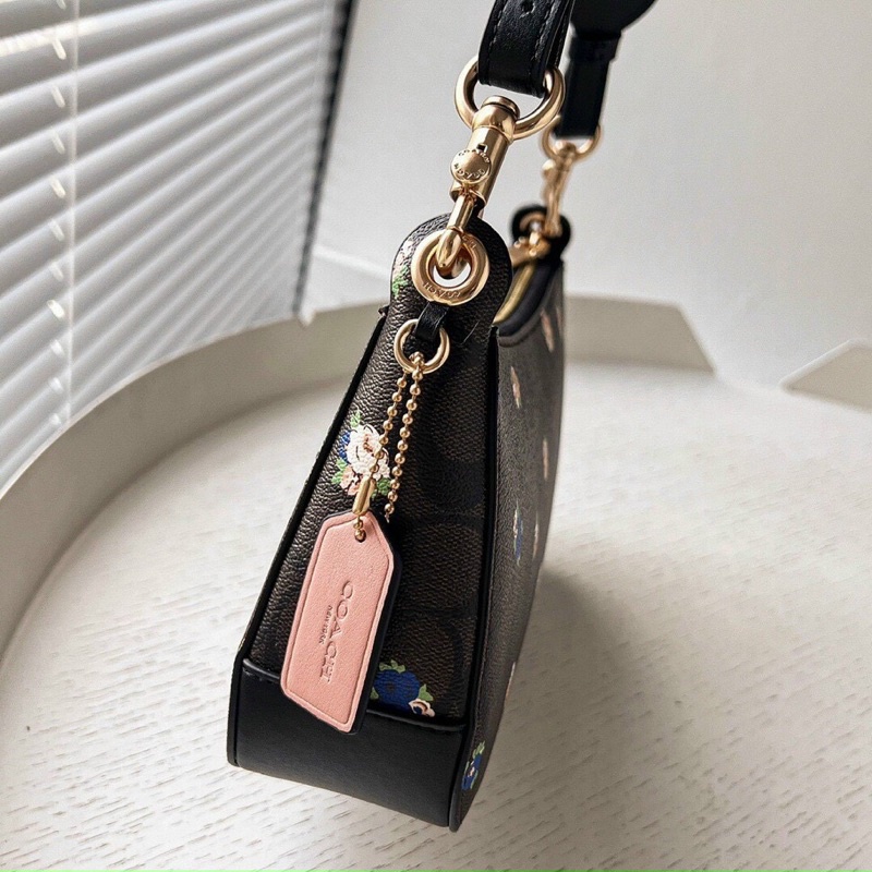 Túi Coach dáng thuyền siêu xịn store