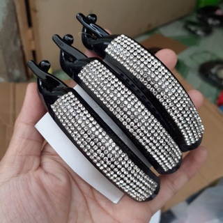 Kẹp cóc ngang đính xoàn trắng.