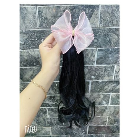 Kẹp tóc nơ xoăn dài cho bé