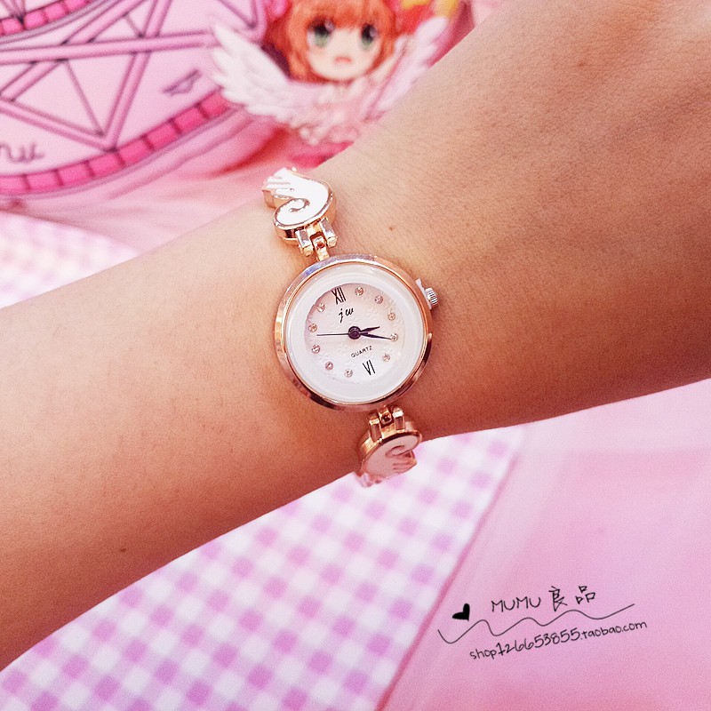 (Đọc kĩ mô tả) Đồng hồ đeo tay nữ đôi cánh Sakura Thủ Lĩnh Thẻ Bài hãng Jue