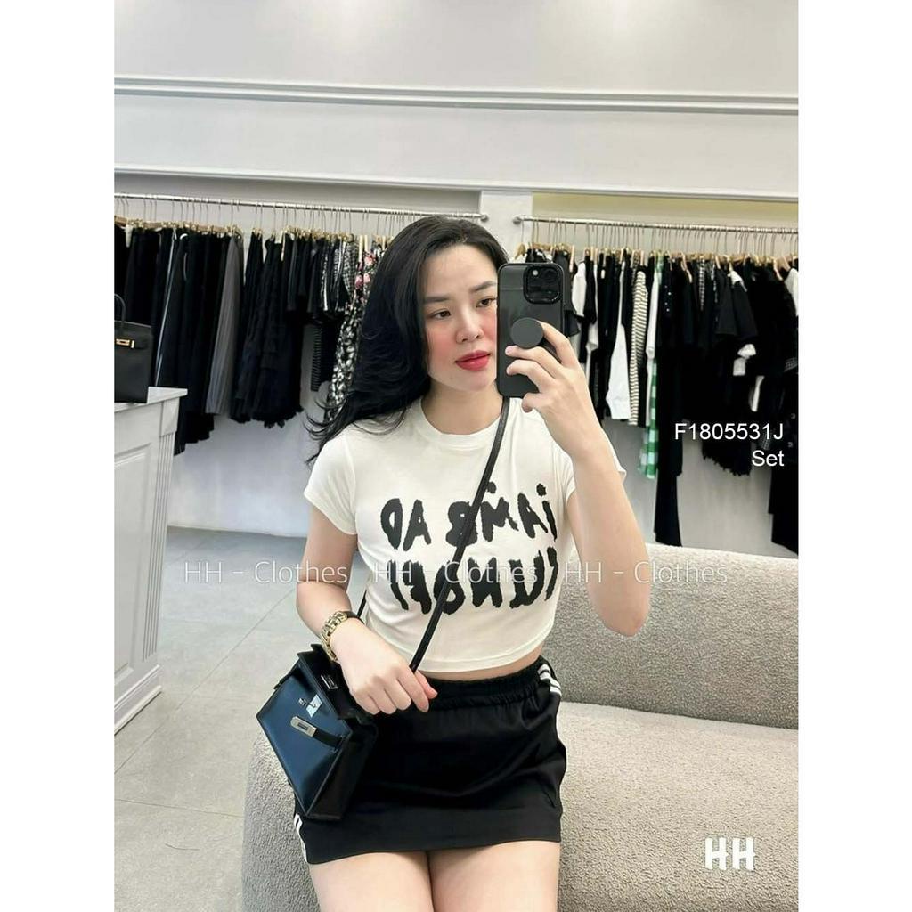 Set bộ thun thể thao áo dáng ngắn in chữ tay con kèm chân váy pha sọc trắng hai bên!