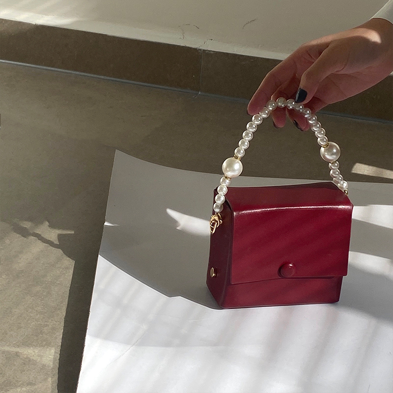 Túi xách thiết kế tay cầm xâu hạt ngọc trai giả phong cách retro Pháp thời trang sang trọng