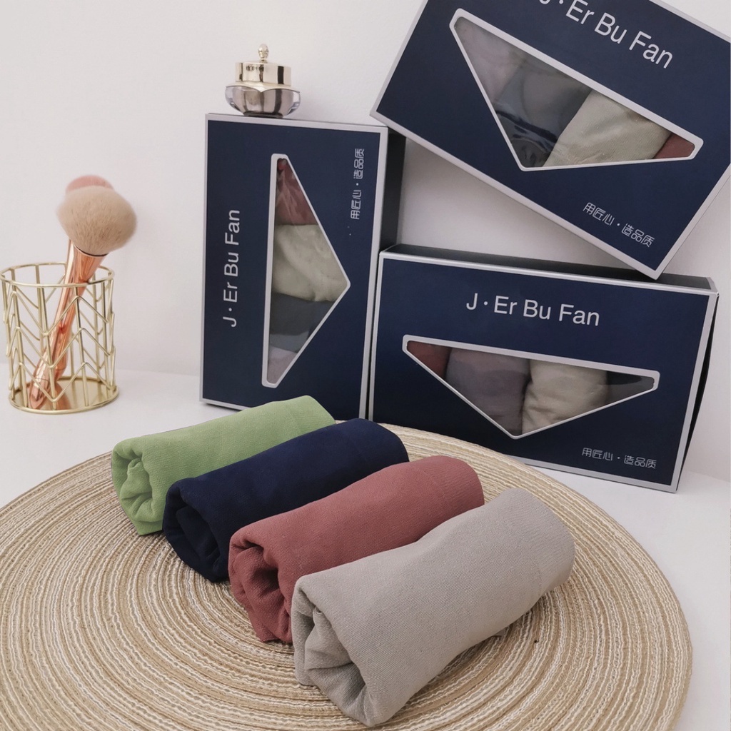 Quần lót boxer lưng vừa không đường may thoáng khí màu sắc đơn giản dành cho nam giới