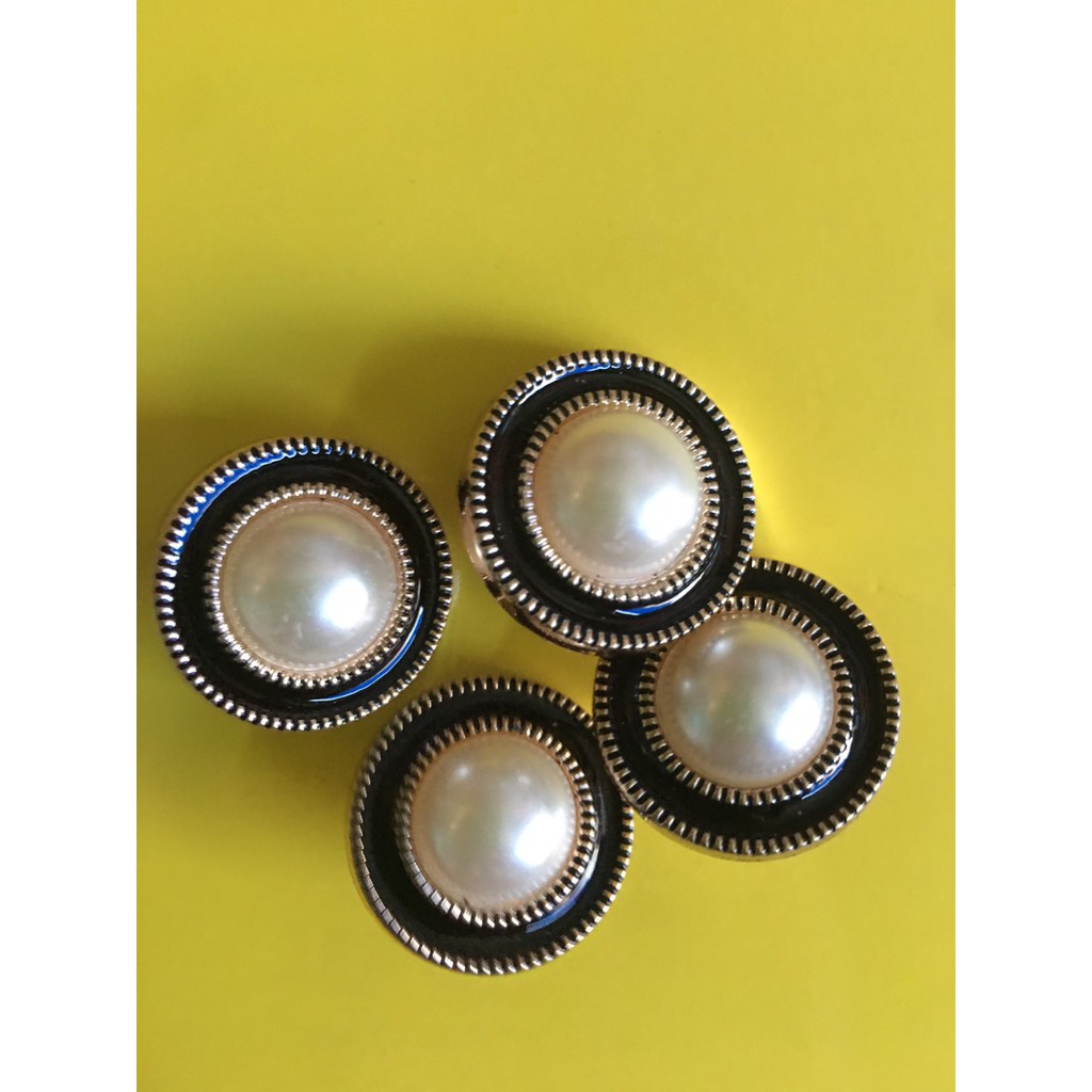 Sét 10 nút ngọc viền đen loại 2cm sử dụng đơm kết áo váy ...