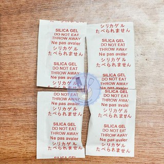 Gói hút ẩm Silica Gel 2 gram bao bì giáy MG cao cấp (500 gói = 1 kg)