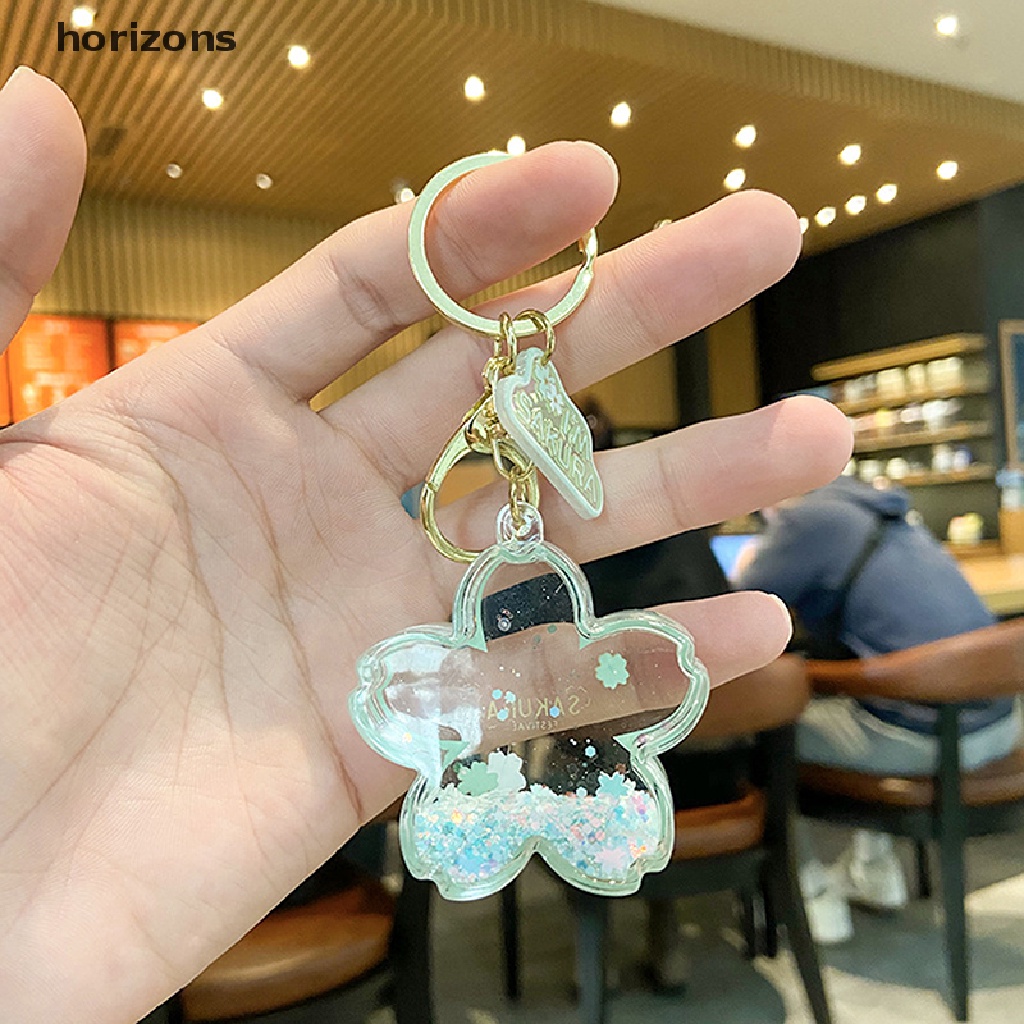 Móc khóa cặp đôi bằng acrylic hợp kim silicon cát chảy có hoa anh đào sáng tạo