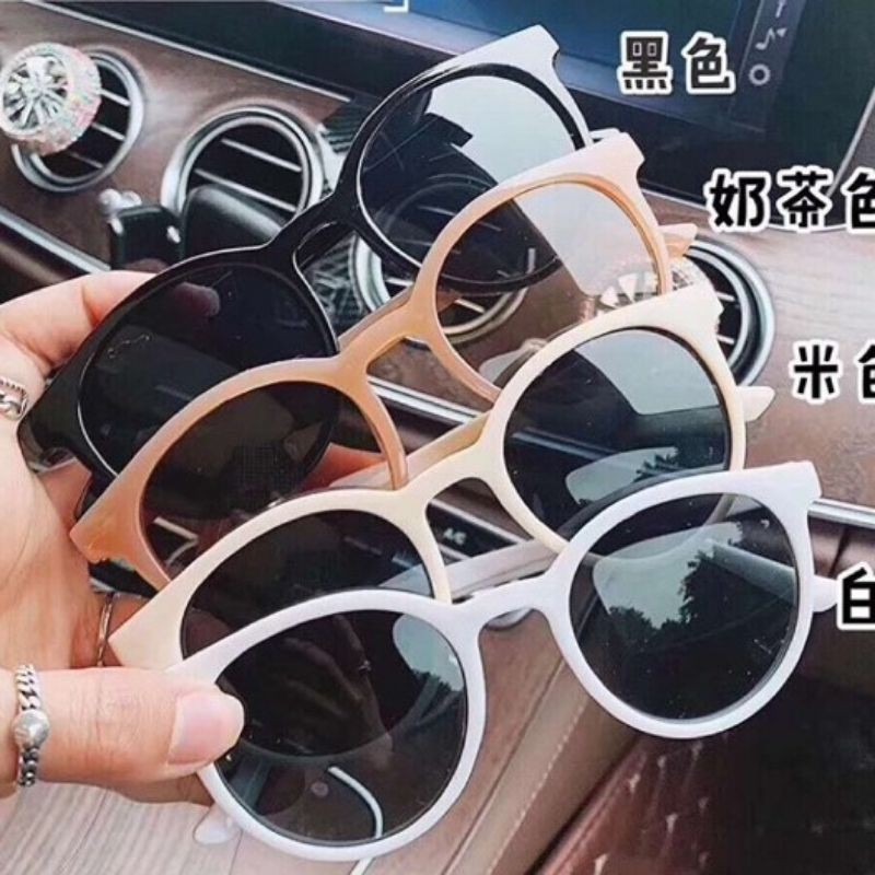 Kính gọng tròn xì tin