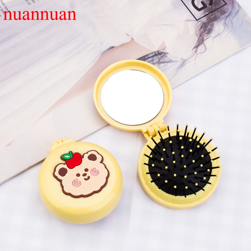Lược nhựa chải tóc mát xa da đầu có gương trang điểm tiện lợi