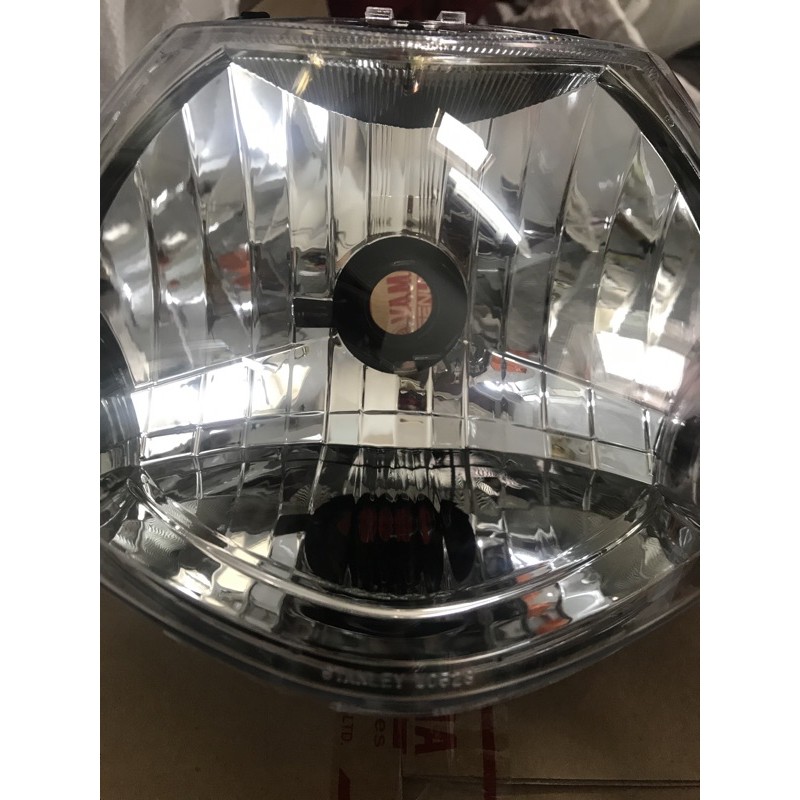 Pha đèn trước  xe Sirius Fi hãng Yamaha