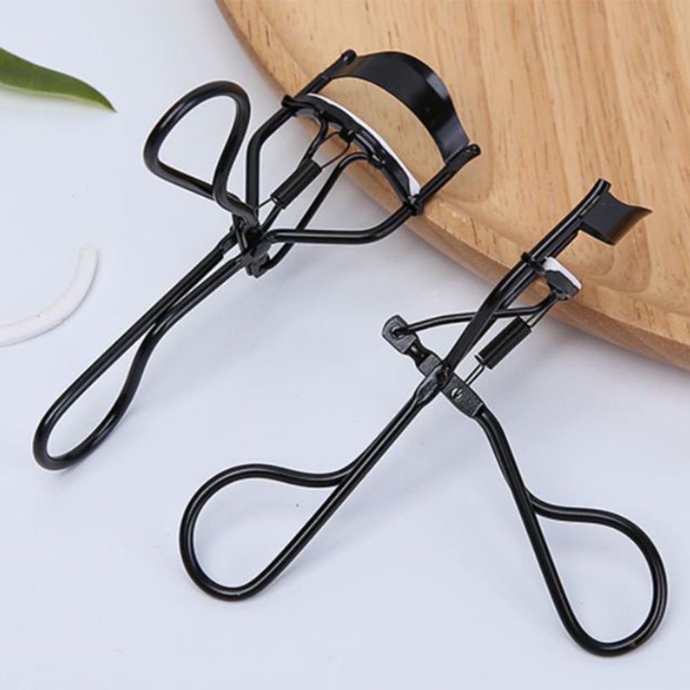 Kẹp bấm mi có răng cưa chất liệu thép không gỉ, mi cong tự nhiên tơi LATUBO Eye Lash Culer NPP Shoptido