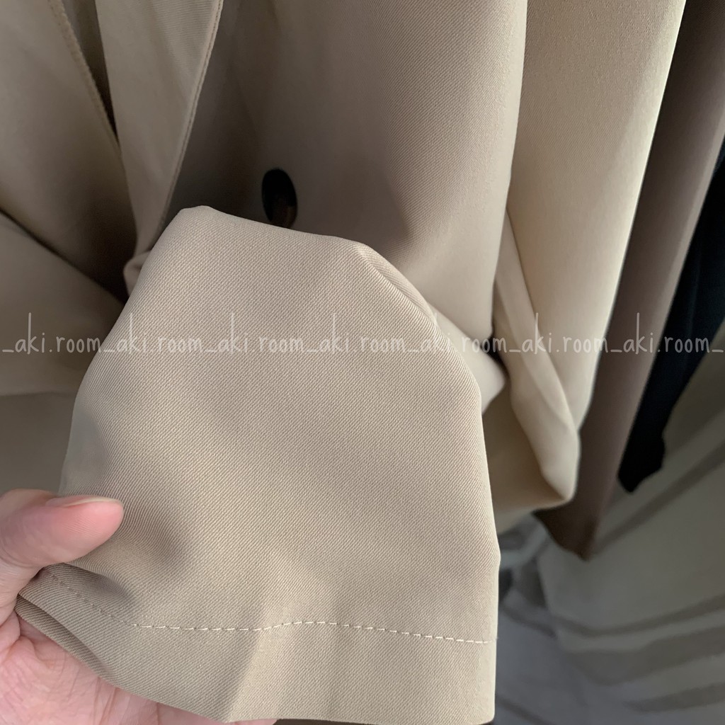 Áo blazer một lớp bốn khuy túi giả ngực trái