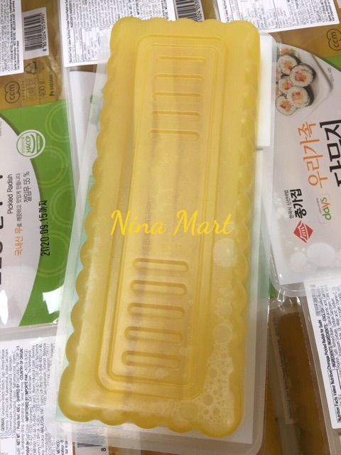 Củ cải vàng cắt sợi Jongga 400g cuộn kipap