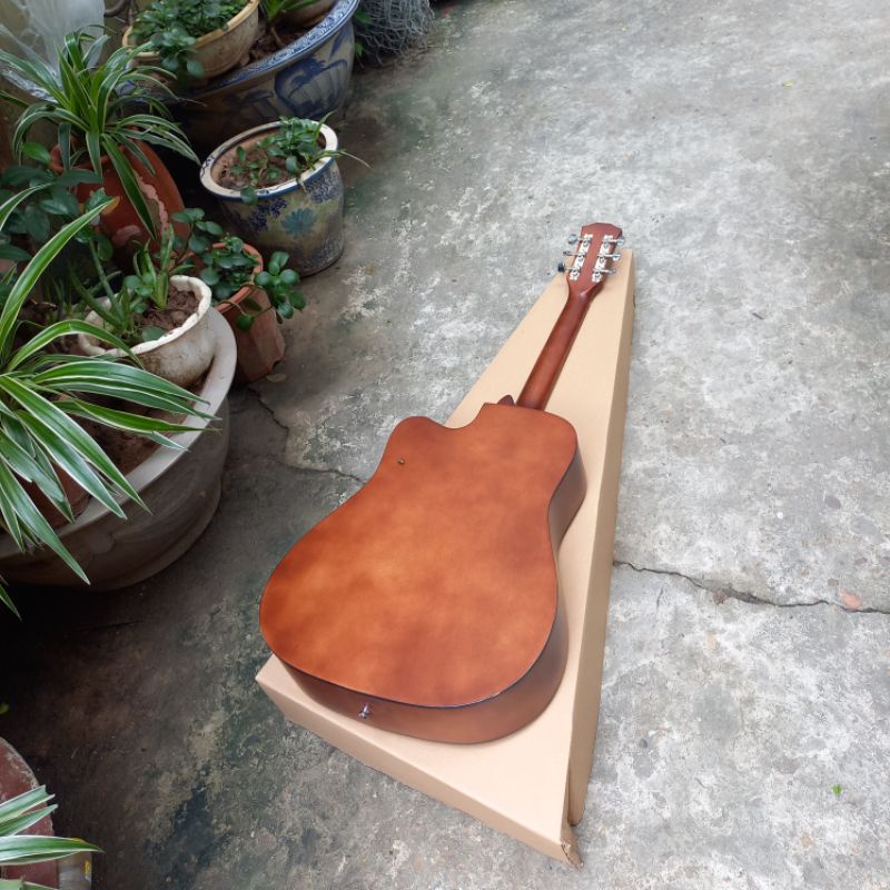 đàn guitar acoustic  màu nâu có ty full 10 phụ kiện