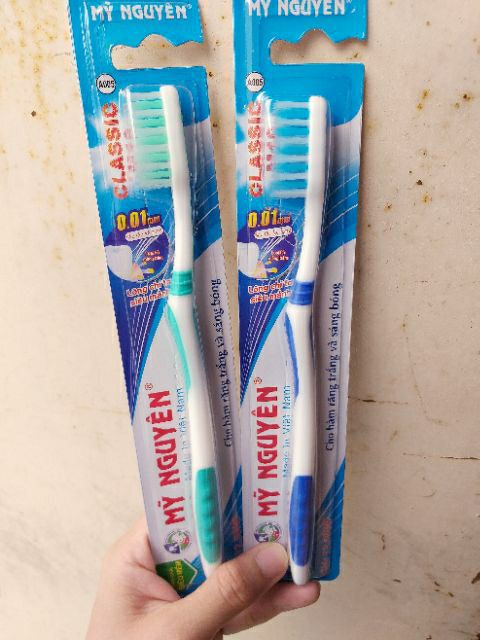 Lố 12 bàn chải đánh răng Mỹ Nguyên người lớn
