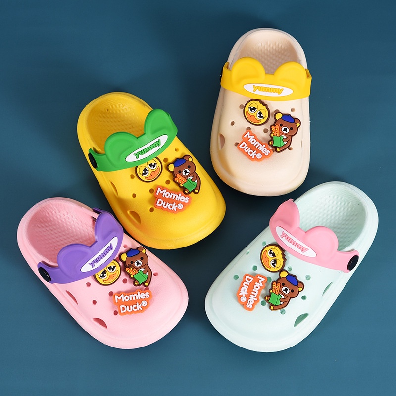 Dép sục Yummy cho bé trai bé gái, sục cross tai gấu kèm charm mềm nhẹ chống trơn Tulastore