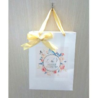 100 Túi giấy in size M phom dọc (giấy dày)