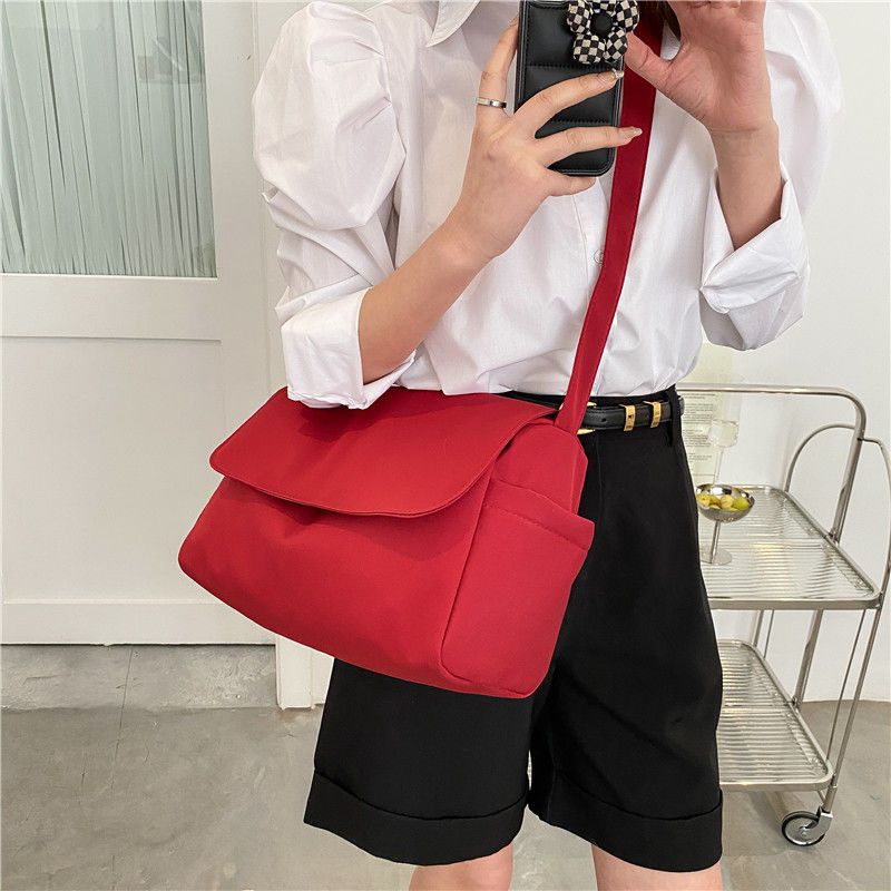 Túi Đeo Chéo Vai Bằng Nylon Chống Nước Sức Chứa Lớn Màu Sắc Đơn Giản Dành Cho Nam Nữ