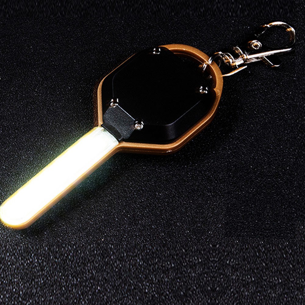 Đèn pin móc khóa hình chiếc chìa khóa độc đáo sài pin đồng hồ.