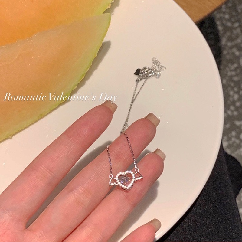 Dây chuyền WE FLOWER mạ bạc S925 mặt hình trái tim đôi cánh thiên thần đính đá pha lê lấp lánh thời trang cho nữ