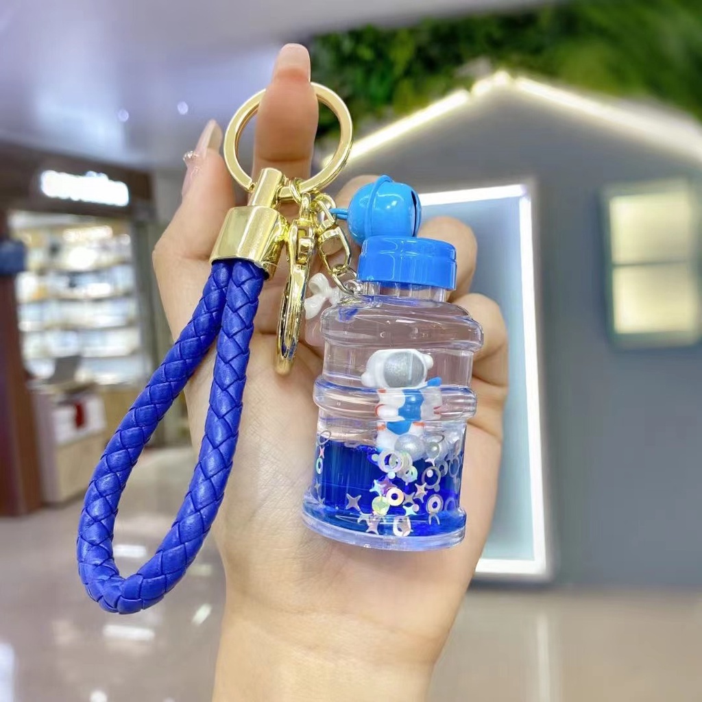 Móc khóa bình nước Phi hành gia xanh dương nhiều kiểu dáng độc đáo làm quà tặng bạn bè người thân móc túi balo -Ráp