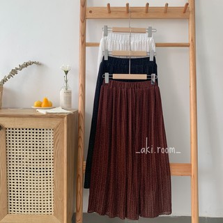 Chân váy xếp ly dài chấm bi nhỏ