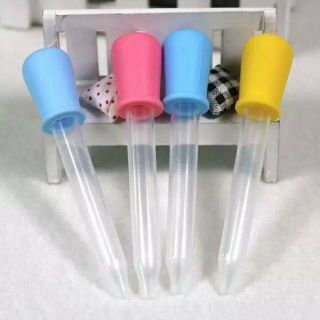 ống uống sữa -bón thuốc cho bé.