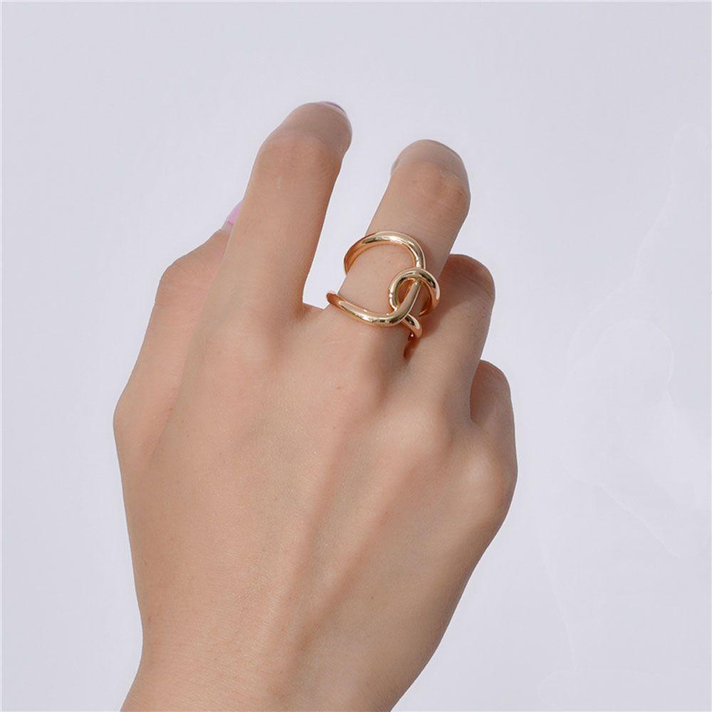 Nhẫn Kim Loại Thiết Kế Xoắn Độc Đáo Thời Trang